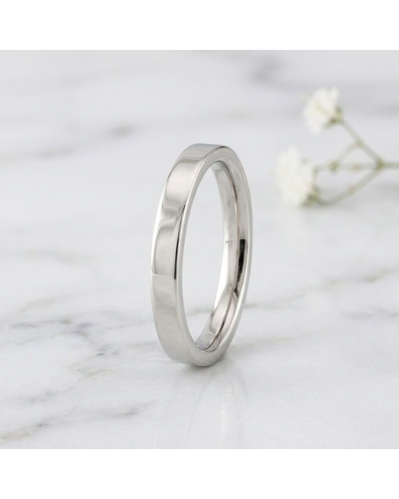 Alliance MATRIX lisse 3 mm homme en or argenté, bague polishing brillante sur marbre blanc