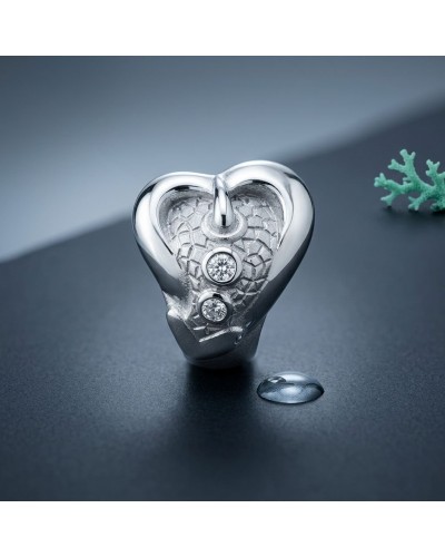 Bague SIRENE en argent brillant en forme de cœur avec motif texturé et deux diamants scintillants incrustés.